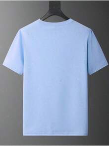 Esta nueva camiseta de manga corta para niña está hecha 100 % de algodón y luce un elegante estampado navideño. Es informal y versátil. Su tejido suave y agradable al tacto es delicado con la piel, lo que permite que las niñas se muevan con libertad y comodidad durante las reuniones familiares, los eventos escolares o los juegos al aire libre. - Azul - Ver 2