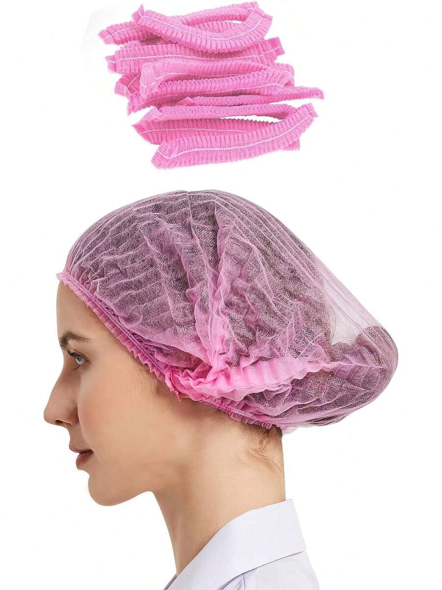 50 piezas Gorros desechables no tejidos estériles, adecuados para extensiones de pestañas, maquillaje, redecilla para el cabello, salón de spa, baño y gorros a prueba de polvo para belleza - Rosa - Ver 1