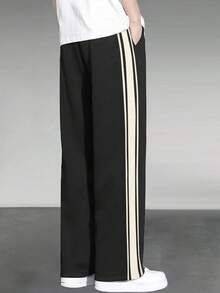 男士休闲宽松运动裤，适合日常通勤、锻炼、跑步、户外活动、健身、慢跑等，直筒裤型，时尚街头风，秋冬季穿着。 - 黑色 - 查看 2