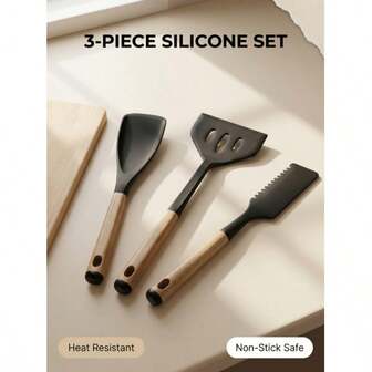 高端黑色硅胶厨具三件套，包括平铲+铲+刮刀，硅胶防刮锅具保护，实木纹理手柄握感舒适，耐高温不粘锅，适用于煎、炒、铲、刮，适合各种厨房风格，实用且高品质。