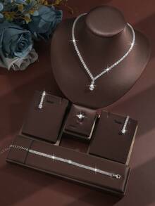 Juego de joyería de 5 piezas con gota de agua incrustada de lujo con rhinestones, que incluye collar, aretes, pulsera y anillo, elegante y de moda para boda, fiesta y uso diario - Plateado - Ver 1