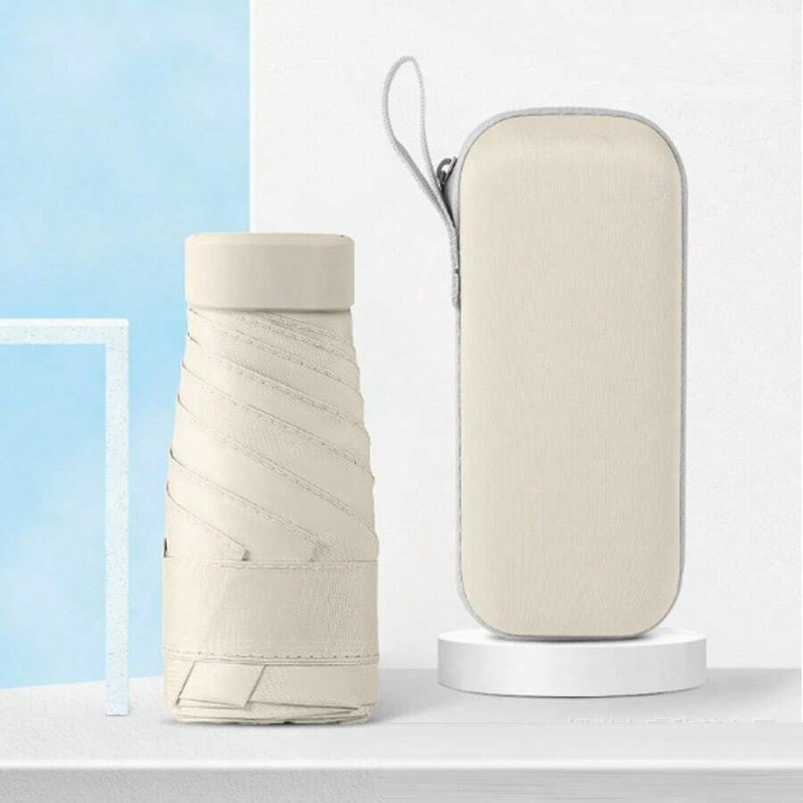 مظلة واقية من المطر والأشعة فوق البنفسجية قابلة للحمل فائقة الصغر مع حافظة، مظلة سفر سهلة الحمل وتناسب الجيب قطعة واحدة - لون مشمشي - مشاهدة 1