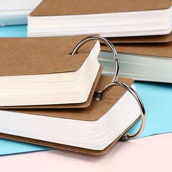 1 X Portable Ring-Bound Notebook With Elegant Clip Design Ideal For University Students And School Supplies. Available In Black And Brown. Suitable For Memo Pads, Diaries And Planners. Creative Stationery Collection, Desk Accessories, Essential Study Organiser, Back-To-School Gift. Stationery Supplies, Office Supplies.