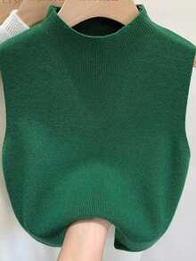 一件女士无袖插肩针织毛衣上衣，领子可拆卸，撞色设计，颜色包括黑色、白色、米色、灰色、粉色和绿色，适合圣诞节装饰穿着