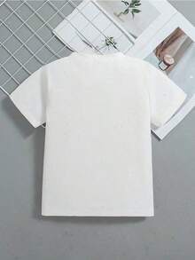 Esta nueva camiseta de manga corta para niño está hecha 100 % de algodón y luce un elegante estampado Navidad. Es informal y versátil. Su tejido suave y agradable al tacto cuida la delicada piel de los niños, permitiéndoles moverse con libertad y sentirse cómodos durante reuniones familiares, eventos escolares o juegos al aire libre. - Blanco - Ver 2
