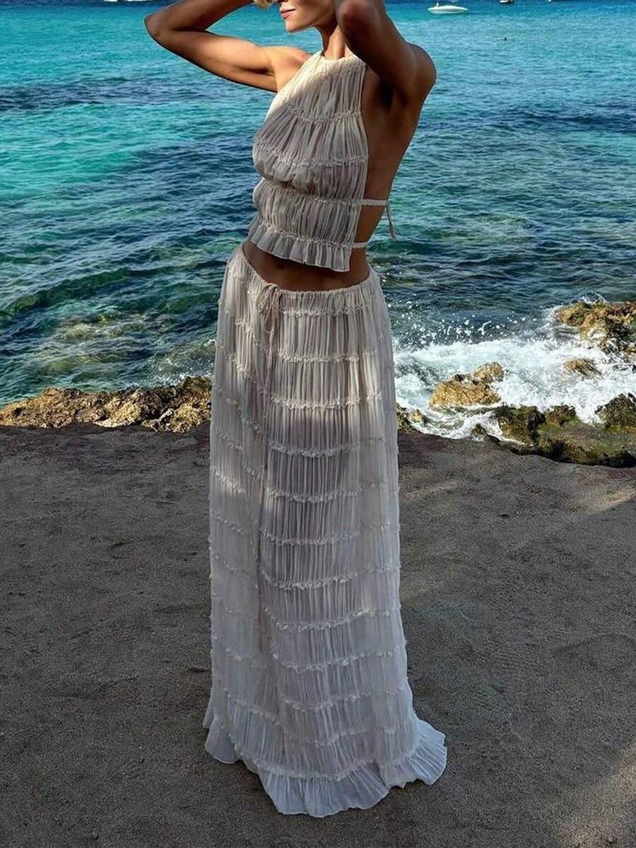 2026春夏女士雪纺层叠荷叶边蕾丝露背吊带两件套，包含长裙和短款上衣，适合情人节、海滩度假、早午餐约会、优雅派对，以及万圣节、哥特风派对和婚礼等场合。这款优雅的露背女士套装是圣诞派对、约会之夜的理想之选，也是春夏的时尚之选。白色。 - 杏色 - 查看 1