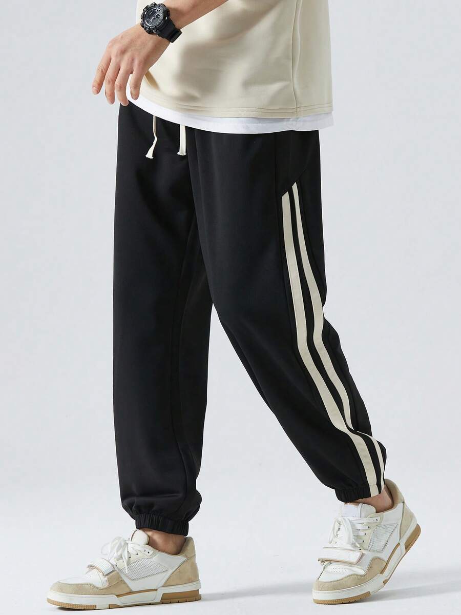 Casual Loose Fit Jogger Pants With Back Pockets, Side Seam Contrasting Stripes And Comfortable Ribbed Cuffs