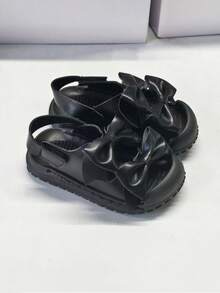 Dép xăng đan đế bằng cho bé sơ sinh, có khóa dán và nơ, chống đá chân. - màu đen - Xem 5