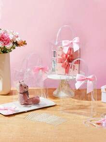 10 piezas Bolsas de regalo de plástico transparente con lazo de cinta, tamaño aproximado de 15x13x7cm (5.9x5.1x2.8 pulgadas), reutilizables, adecuadas para bodas, cumpleaños, baby shower, regalos de boda, obsequios para fiestas nupciales, decoraciones de pasteles, embalaje, decoraciones de fiesta - Rosa Pálido - Ver 5