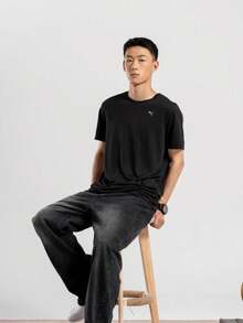 PUMA Unisex American Retro Solid Color Logo Print Crew Neck Loose Short Sleeve T-Shirt 520759-01 - Black - View 2