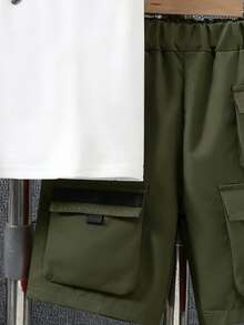 Bộ áo thun ngắn tay và quần đùi kaki in hình bóng đá cho bé trai. - xanh quân đội - Xem 5