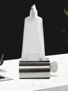 1pc Toothpaste Squeezer, Slouchy Household Toothpaste Dispenser, Manual Rotating Facial Cleanser & Toothpaste Squeezer, Stainless Steel Toothpaste Tube Squeezer, Hair Dye Squeezer, Toothpaste Holder Rack, Suitable For Bathroom, Salon - Silver - View 1