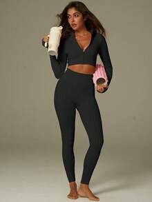 UONNOU 女士运动塑形套装，长袖上衣和裤子两件套，全拉链外套，纹理罗纹条纹，无缝针织面料，收腰提臀，全身塑形，运动拇指孔设计，适合健身、户外瑜伽、轻度运动、跑步、日常休闲穿着，四季皆宜，尤其适合秋冬季节。 - 黑色 - 查看 12