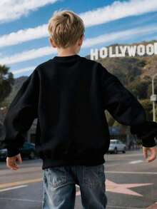 1PC Single-Sided Football Bowl Printing Crewneck Sweatshirt, Autumn And Winter Fleece-Lined Children's Sports Shirt, Perfect For Boys And Girls For Daily Commuting, School, And Casual Sports Wear. A Long-Sleeve Top Ideal For Holiday Parties, Gatherings, Outdoor Activities, And Travel Gifts For Children. - 黑色 - 查看 3