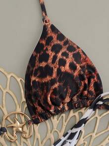 女士性感斑马纹和豹纹细肩带比基尼丁字裤，饰有系带细节和海星图案