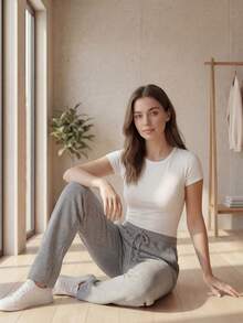 DEVIT - Pantalón jogger estilo loungewear con cintura lisa sin resorte y jareta ajustable – diseño minimalista oversized, tela mate suave, bolsillos laterales discretos, ideal para uso diario casual y cómodo - Gris - Ver 7