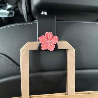 Dos piezas Ganchos para asiento trasero de coche con diseño de flores de cerezo - Contenedor de almacenamiento con patrón floral blanco, Soporte de fijación de plástico negro, Accesorio interior de coche multifuncional, Adecuado para colgar bolsos y otros artículos, Decoración de moda, Diseño sencillo