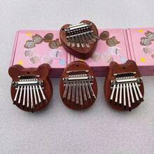 Piano de pulgar Kalimba mini de 8 teclas con colgante, piano de dedo delicado como decoración, adecuado como regalo de Navidad para principiantes