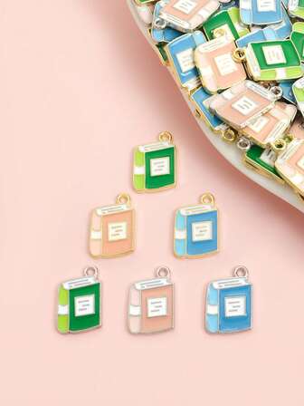 10 piezas de 3 colores Encantos de libro de aleación con efecto de goteo, coloridos colgantes de diccionario para hacer collares, pulseras, llaveros, broches, marcadores de libros y talla grande ornamentos de cadena creativos - regalos ideales para estudiantes en el regreso a clases