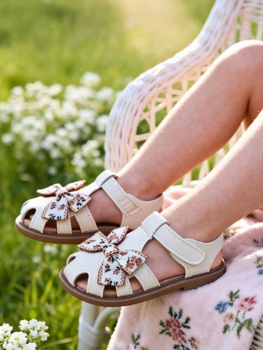 1双女童公主蝴蝶结镂空平底凉鞋，防滑软底，夏季新品 - 米色 - 查看 1