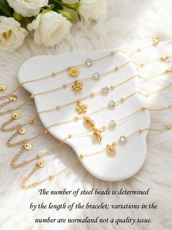 1 pieza Exquisita y encantadora pulsera con colgante de acero inoxidable chapado en oro para mujer, joyería de alta calidad con diamantes incrustados en forma de piña, fresa, seta o flor, accesorio de muñeca, regalo de Navidad y Año Nuevo.