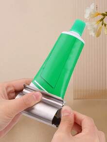 1pc Toothpaste Squeezer, Slouchy Household Toothpaste Dispenser, Manual Rotating Facial Cleanser & Toothpaste Squeezer, Stainless Steel Toothpaste Tube Squeezer, Hair Dye Squeezer, Toothpaste Holder Rack, Suitable For Bathroom, Salon - Silver - View 2