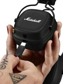 Marshall Major IV 无线蓝牙耳机，超长续航，支持无线充电，强劲低音，可折叠贴耳式设计，轻巧便携，适合旅行、健身、游戏、音乐等多种场景，兼容 iOS 和安卓系统。 - 棕色 - 查看 8