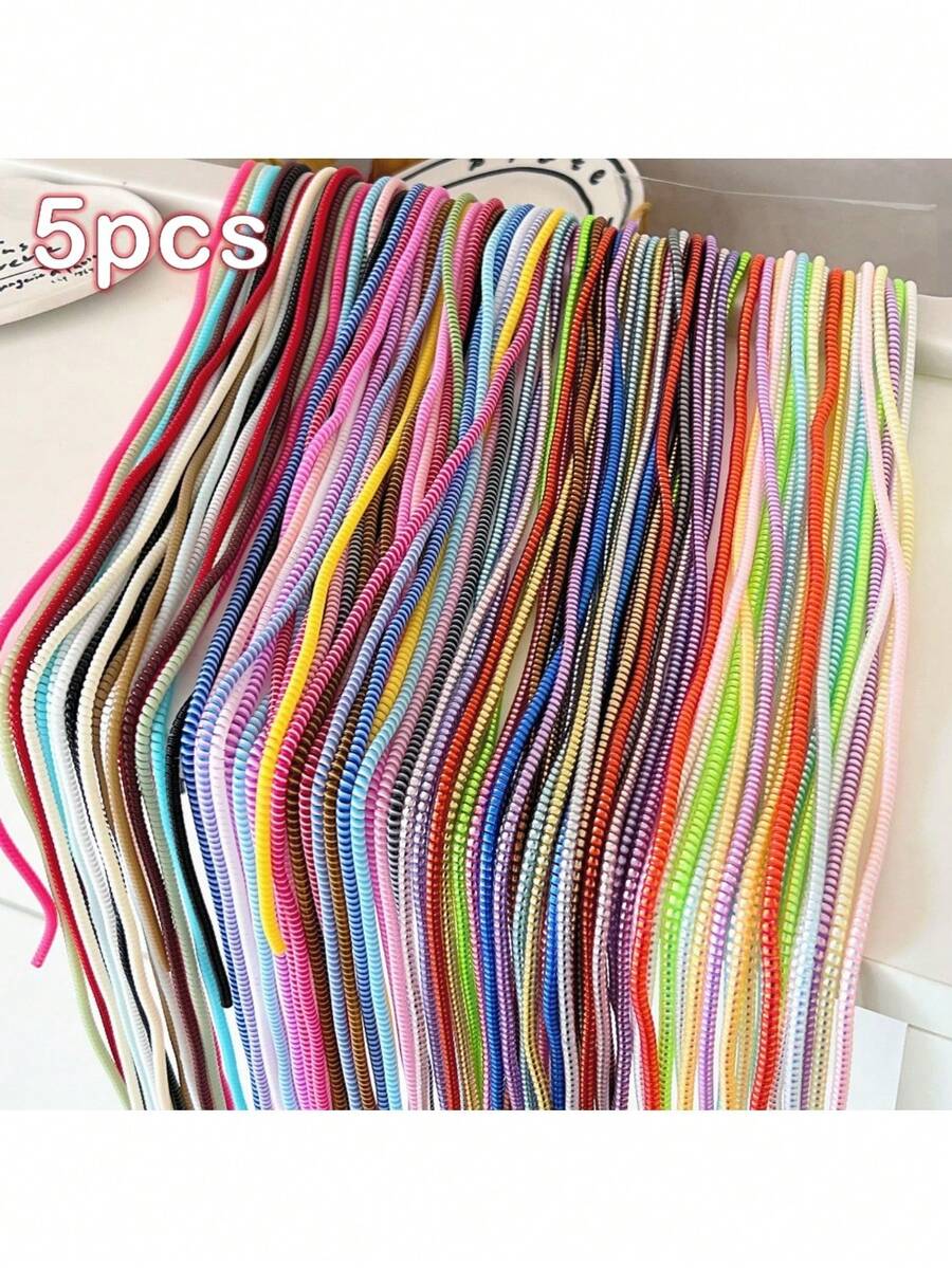 Bộ 5 chiếc bảo vệ cáp (màu ngẫu nhiên), phù hợp với hầu hết các loại sạc điện thoại, chiều dài 1.4m, giúp cuộn gọn cáp sạc để tránh bị uốn cong và đứt. - Nhiều màu - Xem 1