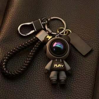 1 Set de Llavero encantador y de moda con oso de relámpago, colgante de muñeca de pareja de dibujos animados, adecuado para llavero, colgante de bolso y llavero de astronauta creativo