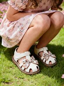 1双女童公主蝴蝶结镂空平底凉鞋，防滑软底，夏季新品 - 米色 - 查看 3