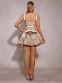 Novo vestido curto feminino com cintura vazada, franjas, decote em V, sem mangas, modelagem justa e saia evasê. Ideal para casamentos, damas de honra, festas de Natal e coquetéis. - Damasco - Ver 9