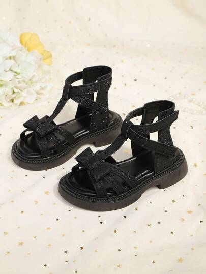 1 Pair Black Plus Size Toddler Girls' Glitter Studded Leather Bowknot Criss-Cross Strap Roman Sandals, Classic Double Buckle Round Toe Flat Non-Slip Fashionable Cute Princess Beach Casual Shoes For Spring/Summer 2026
