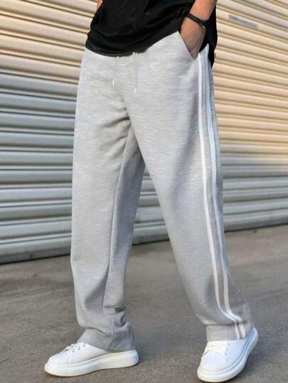 男士条纹纯色户外运动休闲裤，价格实惠，采用抽绳腰带和松紧腰带设计，款式简约日常，适合喜欢户外活动的男孩和男士。