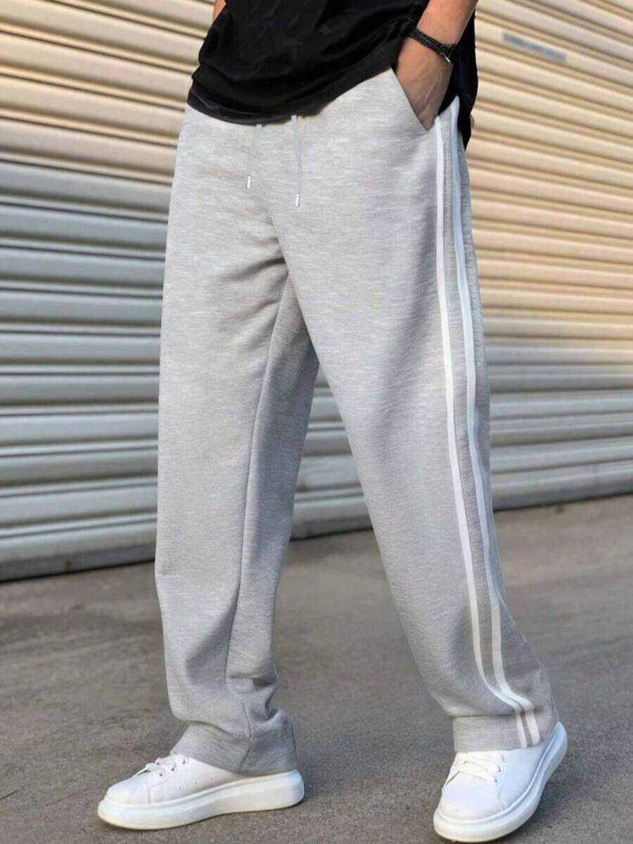 男士条纹纯色户外运动休闲裤，价格实惠，采用抽绳腰带和松紧腰带设计，款式简约日常，适合喜欢户外活动的男孩和男士。 - 淺灰色 - 查看 1