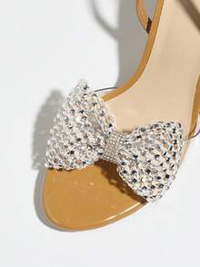 Women's High Heel Shoes, Fashionable And Elegant For Parties, Outdoor Events, And Formal Occasions. Features Include: Stiletto Heel, Round Toe, Sparkling Rhinestones, Oversized Bow Accent, PVC Transparent Glass-Like Material, Textured Stone-Like Pattern, Ankle Strap, Versatile And Suitable For Dresses. Available In Camel Color. - Camel - View 6