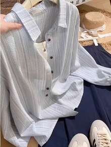 Áo sơ mi nữ dài tay cổ bẻ thanh lịch, cài cúc phía trước, dáng suông, họa tiết sọc xanh trắng. - Màu xanh lam - Xem 7