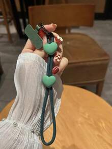 1条心形手机挂绳，长度可调节，可爱精致，品质高端，防止手机丢失，适合年轻女孩。附赠枕头，适合作为生日、节日礼物送给母亲、家人、朋友，也可作为手机挂饰使用。 - 彩色 - 查看 9