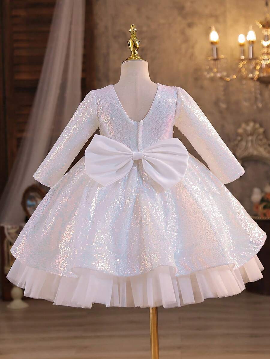 Chiếc đầm dài tay cổ tròn đính sequin lấp lánh quyến rũ này rất phù hợp cho các bé gái mặc trong những dịp quan trọng, chẳng hạn như đám cưới phù dâu, tiệc sinh nhật, biểu diễn sân khấu và các lễ hội quan trọng khác.