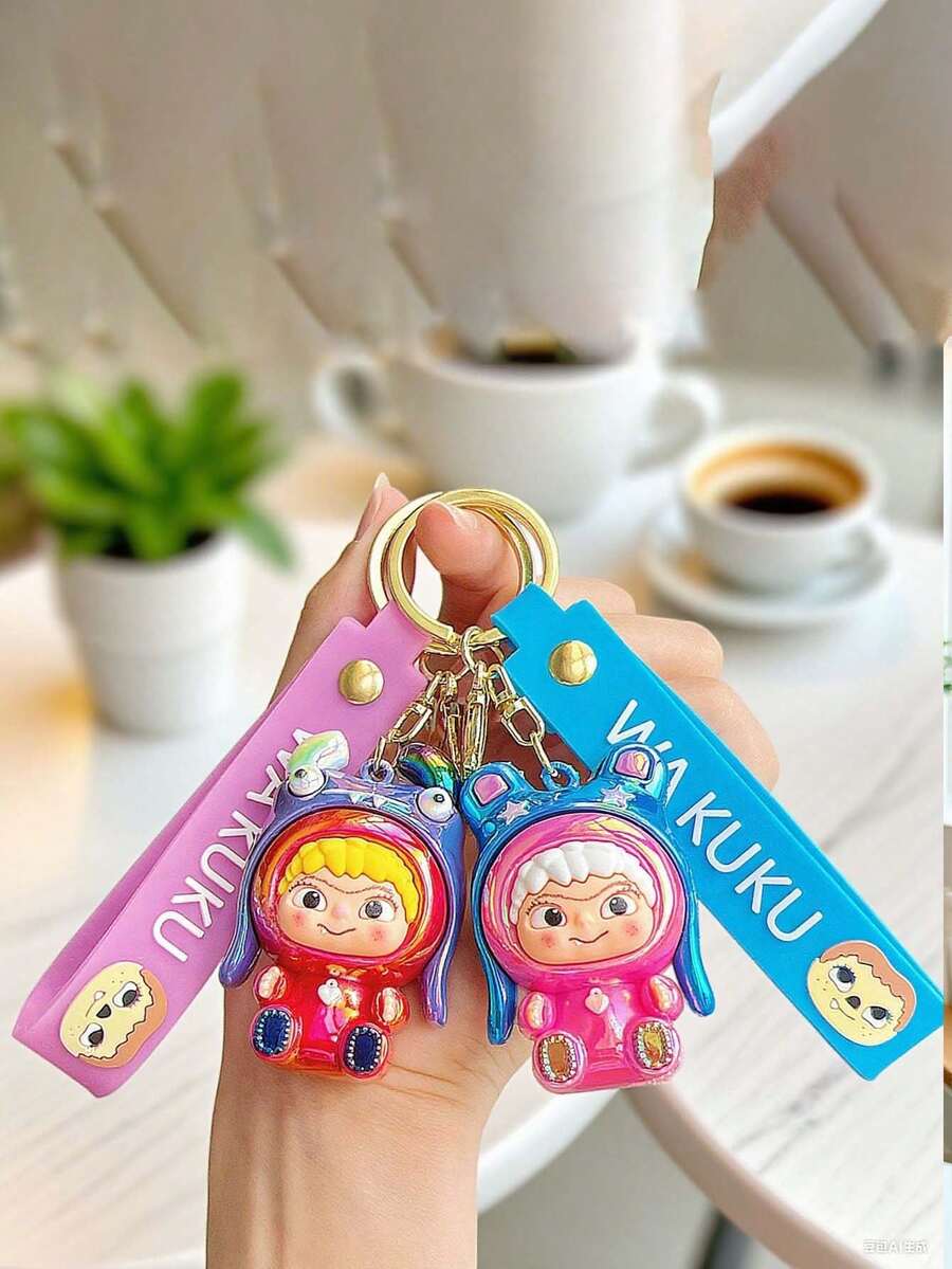 1个镀金Wakuku卡通3D立体钥匙扣挂件,可挂在汽车包包上(部分产品可能存在褪色或印刷错位,此为正常现象。)适合送给母亲、父亲、毕业生和老师。 - 彩色 - 查看 1