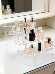 1 قطعة - رف عرض متعدد الطبقات من البلاستيك الشفاف، تصميم شبه منحرف/حواف مستديرة للحماية، رف تخزين للعطور والمجوهرات والدمى والمستحضرات التجميلية، سهل التركيب ومتين، حقيبة مستحضرات التجميل، ضروريات السفر - شفاف - مشاهدة 3