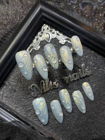 10-pack mandel akrylnagelkit, ljusblå cat eye-mönster med heltäckande press-on-nagelset i kombination med handritade vattenripplar och 3D tredimensionella vattendroppsmönster för en rikare look, lämplig för söta tjejers Y2K-stil nagelkonstset, lämplig för kvinnor eller tjejer till vardags, fester, ritualer, festivalkläder (inkluderar: en bit gelélim och en friktionsremsa) Nageltillbehör Naglar