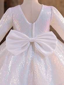 Chiếc đầm dài tay cổ tròn đính sequin lấp lánh quyến rũ này rất phù hợp cho các bé gái mặc trong những dịp quan trọng, chẳng hạn như đám cưới phù dâu, tiệc sinh nhật, biểu diễn sân khấu và các lễ hội quan trọng khác. - trắng - Xem 5
