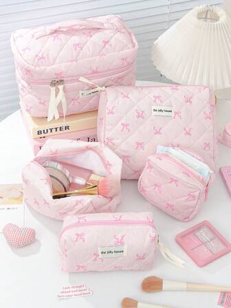 1 pieza/Set Bolsa de cosméticos con gran capacidad y estampado de lazo rosa, bolsa de maquillaje acolchada de moda, bolsa de maquillaje de viaje para niñas, bolsa de cosméticos para damas, bolsa de almacenamiento linda para el hogar, bolsa de almacenamiento multifuncional que puede contener lápiz labial, toallas sanitarias, monedas, llaves, pinzas para el cabello, lazos para el cabello, etc., bolsa de aseo de viaje espaciosa y linda, bolsa de maquillaje de viaje