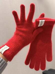 女士保暖触屏露指手套一双，纯色针织加厚加长款，适合秋冬季节佩戴。