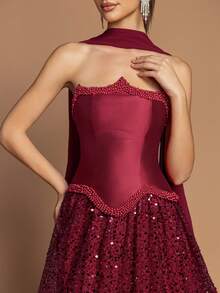 This Elegant Strapless Fitted Waist Long Evening Gown, Adorned With Beaded Embellishments, Features A Back Tie Design, And Comes With A Matching Shawl And Flowing Glittery Mesh Maxi Skirt - Making It An Ideal Choice For Weddings, Formal Galas, Awards Ceremonies, And Red Carpet Events. - Burgundy - View 6
