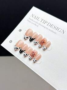 10 Pieces Of Purely Handmade Press-On Nail Tips, Featuring Short Almond-Shaped Nail Forms And A Press-On Style For Fake Nails. They Boast A Popular And Fashionable Style, With Hand-Painted Black And White Animal Print Leopard Patterns Combined With Polka Dot French Tips, As Well As Hand-Painted Three-Dimensional Flowers. These Are High-End, Skin-Whitening Finished Nail Tips Suitable For Daily Wear By Women And Girls, And Come With A Nail Kit. - Multicolor - View 5