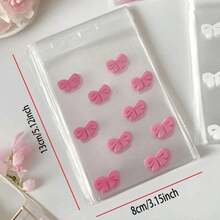 100个粉色蝴蝶结自粘袋照片卡片拉链袋包装卡片礼品袋透明可爱OPP袋返校、毕业、派对、婚礼、生日、伴娘生日、包装、透明、小尺寸、婚礼派对回礼、生日派对、纪念品、新娘礼物、单身派对用品、礼品包装 - 淺粉色 - 查看 3
