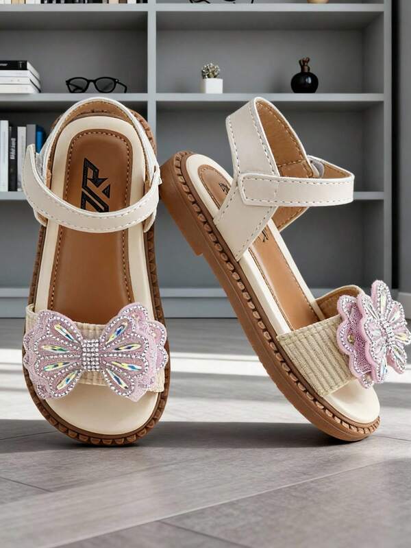 Sandalias planas de princesa con tira ajustable en T, puntera abierta, decoración de mariposa de cristal y brillo, para niñas de 3 a 8 años, zapatos de verano para exteriores