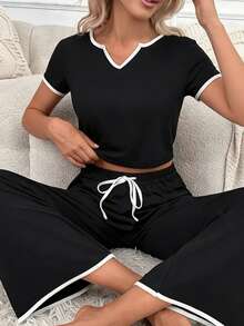 Bộ đồ ngủ nữ phối màu đen trắng, áo tay ngắn cổ chữ V + quần dài, trang phục thường ngày thanh lịch, thích hợp cho mùa xuân. - Đen và trắng - Xem 1