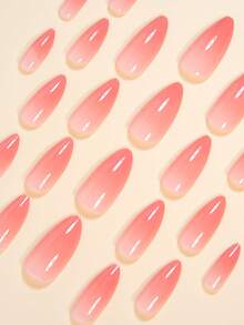 24片杏仁形极简渐变粉色全覆盖假指甲，瞬间提升您的美甲造型！这款美甲贴片适合女性和女孩，包含1张粘性贴纸和1个迷你指甲锉，适合派对、约会和日常佩戴。随机包含果冻凝胶美甲贴片。